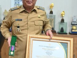 Cik Ujang.SH Bupati Lahat Yang Memiliki Segudang Prestasi